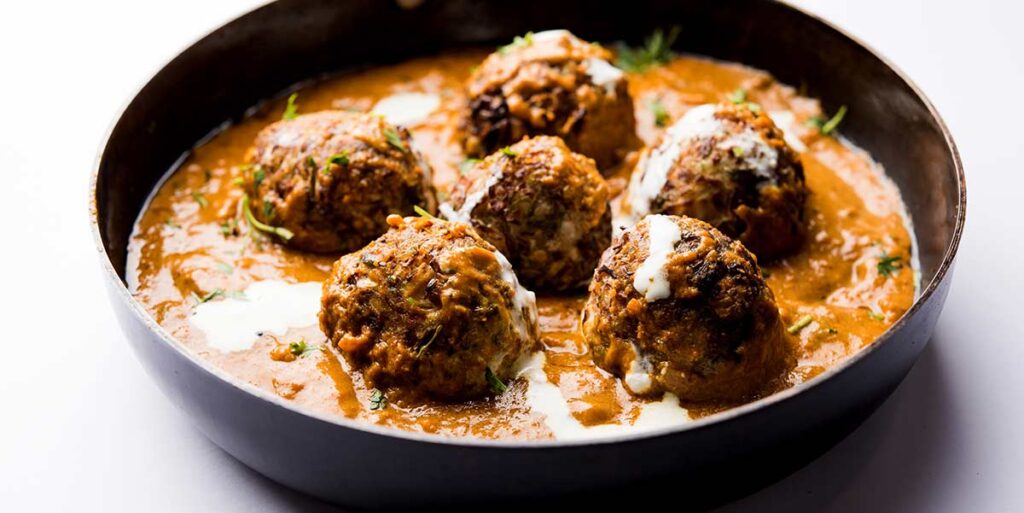 Malai kofta, vegetable meatballs with sauce