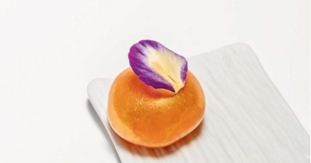 Gold plated red prawn bonbon